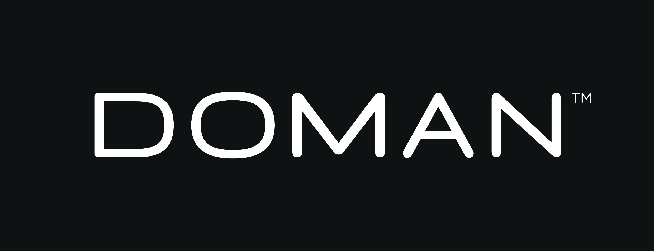 Doman logo tm reverse